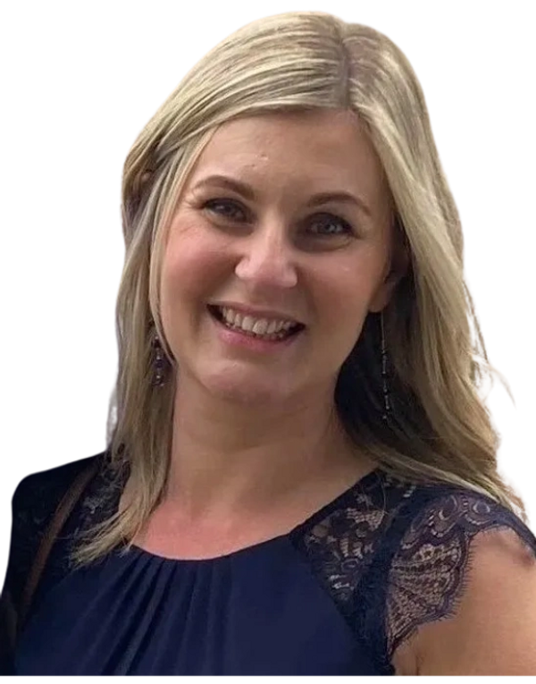 Smiling woman with blonde hair in a navy lace dress.