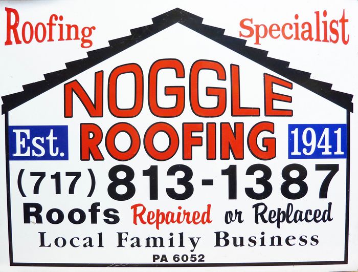 Sign for Noggle Roofing, a local family roofing specialist since 1941.