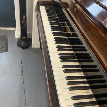Close-up of an old piano keyboard.