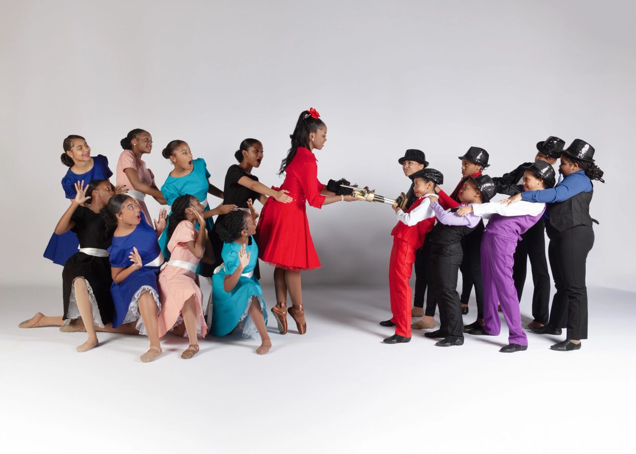 Motown Nutcracker, 2024: Diana and Michael tugging over the Motown Nutcracker gift from Uncle Sammy!