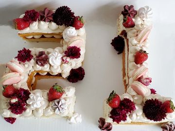 Number cake with flowers berries 