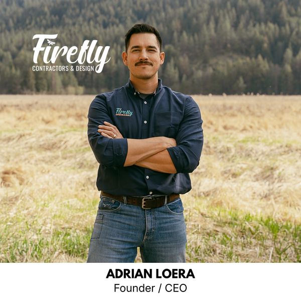 Adrian Loera, founder and CEO of Firefly Contractors &amp; Design, standing confidently outdoors.