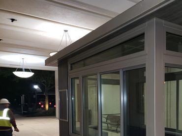 Custom aluminum service window installation