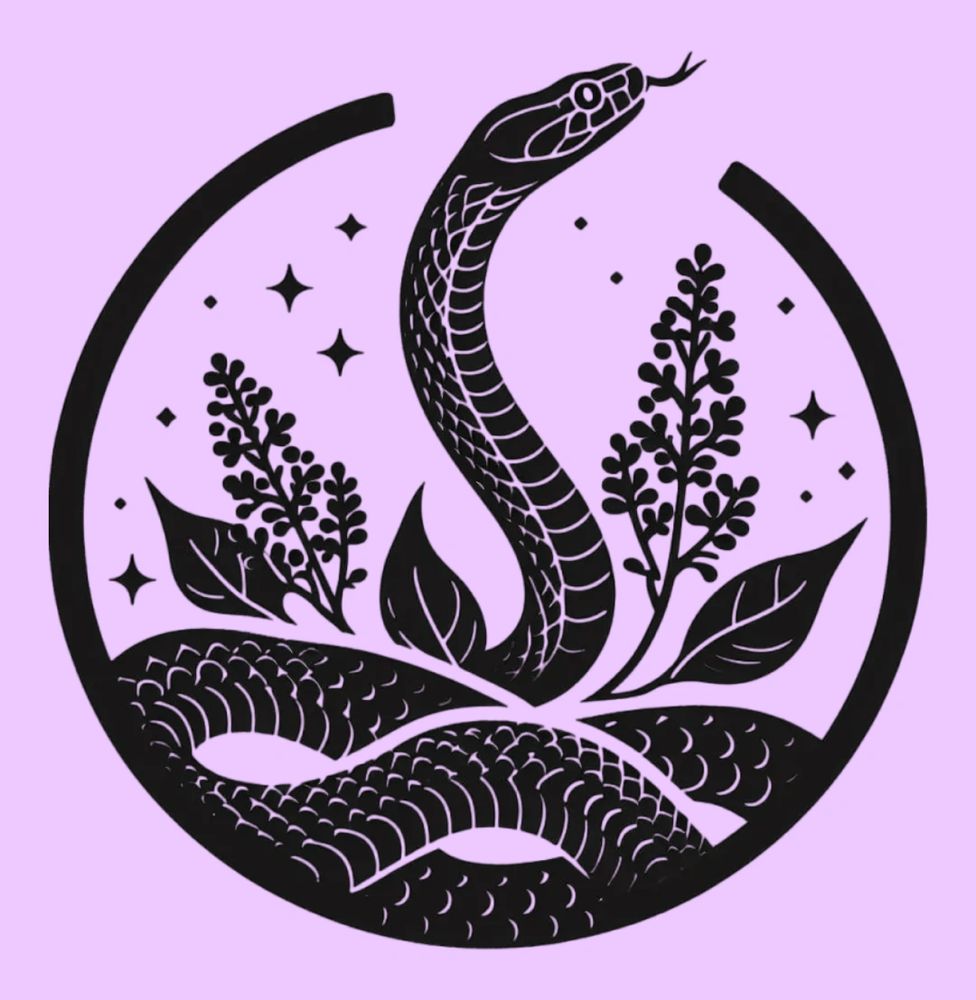 Stack of books next to pencils in a holder and a camera.