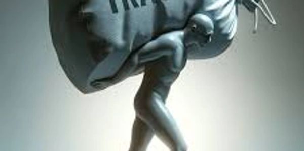 Man weighed down by large sack of traumas