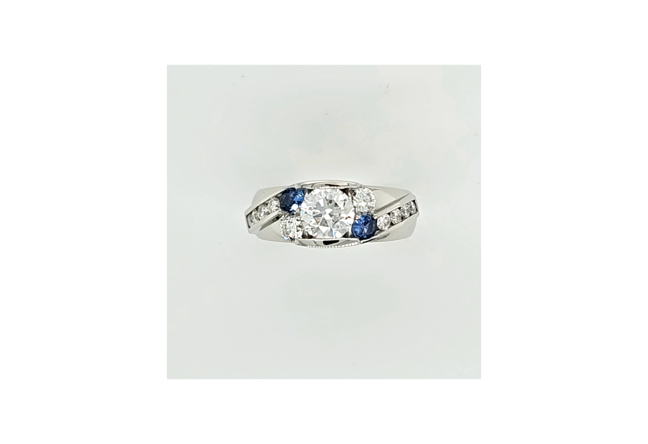 14kt. white gold custom ring with Yogo sapphires and diamonds. 