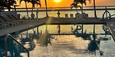 Image of the pool and palm trees by the Banana River, Florida