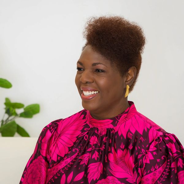 Woman smiling.