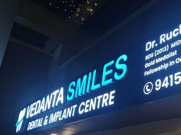 Vedanta Smiles Dental & Implant Centre clinic signage in Gurgaon