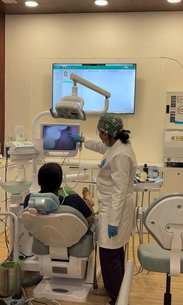 Experienced dental specialist performing treatment at Vedanta Smiles Gurgaon