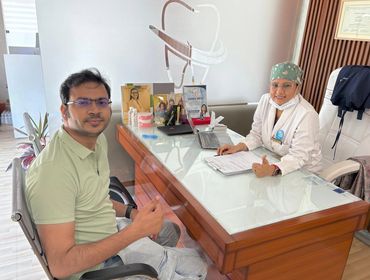 Happy and satisfied dental patient after treatment at Vedanta Smiles Dental Clinic Gurgaon