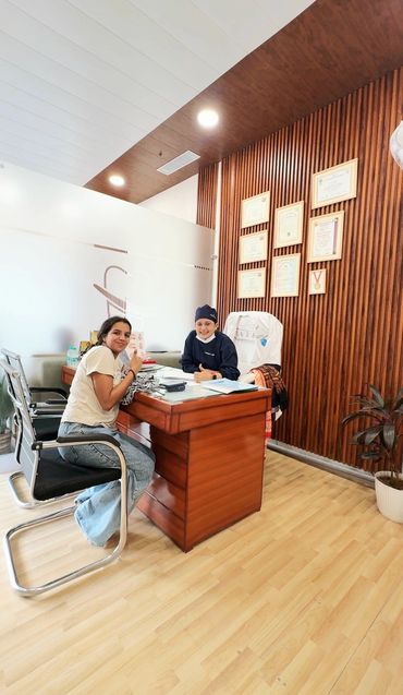 Patient smiling after restorative dental care to help improve tooth function and appearance.