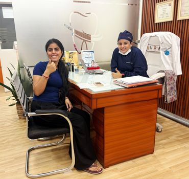 Happy patient after receiving personalized dental care at Vedanta Smiles Dental Sector 83 Gurugram