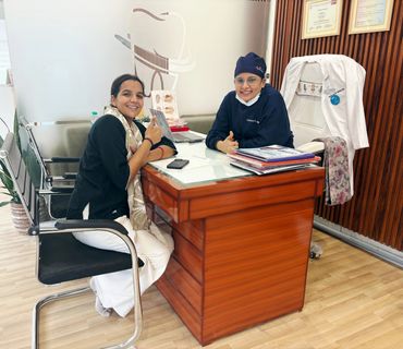 Patient smiling after a dental visit focused on gum health and oral hygiene.