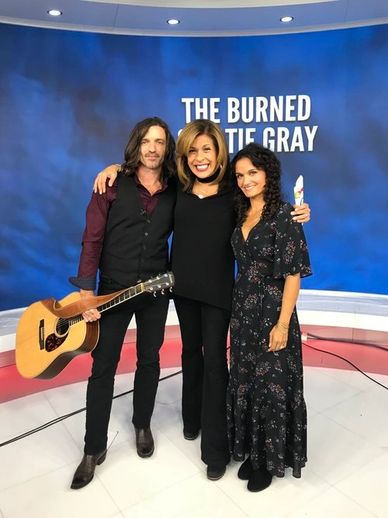 Kurt Baumann and Katie Gray from The Burned sing on The Today Show.  Pictured  here with Hota Kotb.
