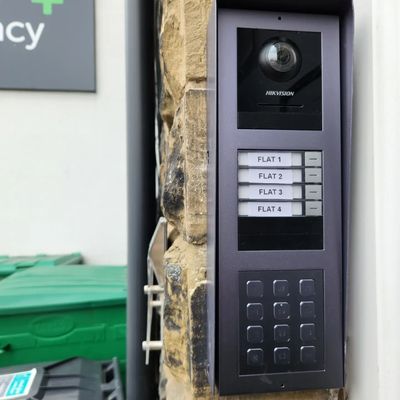 Security intercom system with camera and keypad for flats.