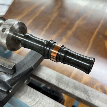 Goose call, stabilized wood dyed black with copper band