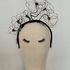 Custom fascinator,very light to wear,fun and contemporary millinery
