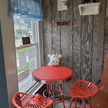 Indoor seating at Cream of the Crop Ice Cream Shop