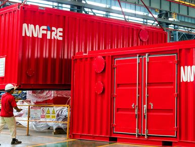 Fire pump package set in a container