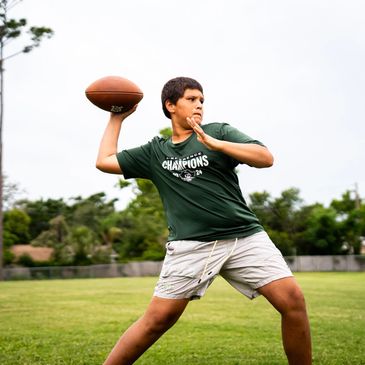 Quarterback practicing throwing mechanics and footwork drills at Route Tree Performance in Tampa, FL
