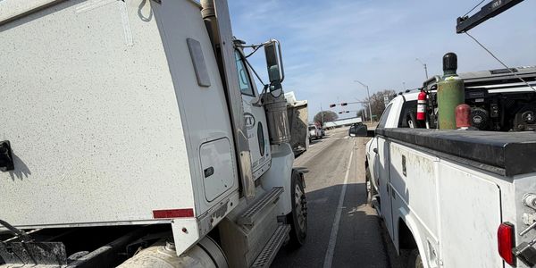 Waco Road Service truck providing a diesel fuel delivery on IH-35 in Waco TX