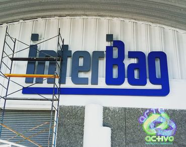 New sign installation for InterBag in progress with scaffolding.