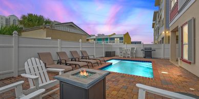 Seas The Day is a private heated pool & hot tub home with fire pit and also golf cart