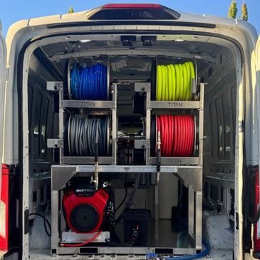 Van mounted pressure washing skid