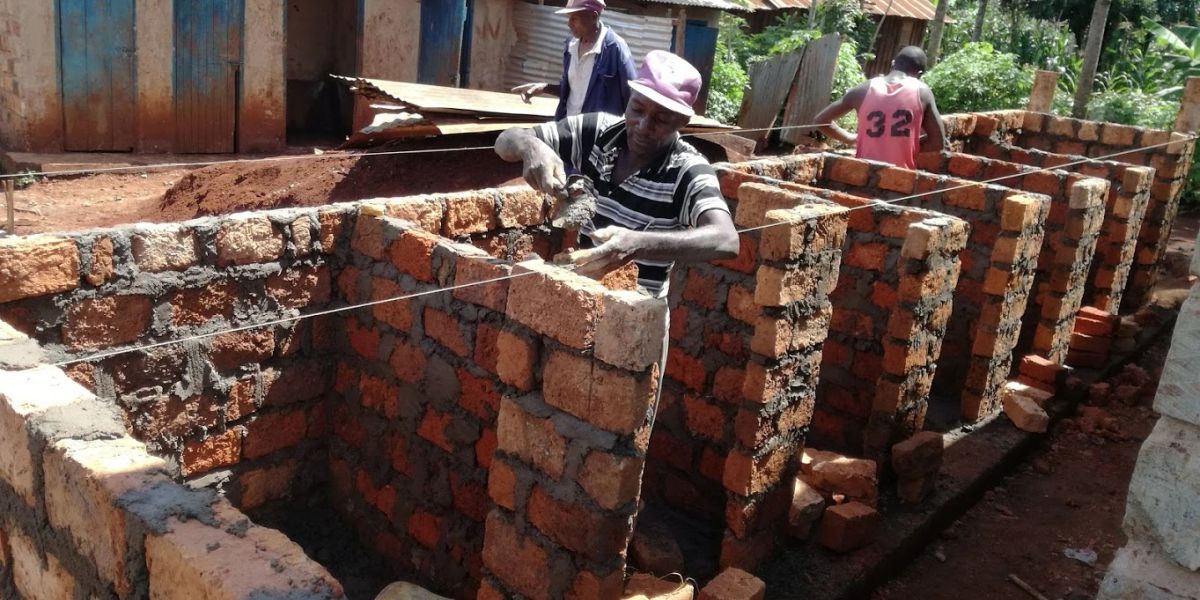 Brick construction work for community sanitation infrastructure