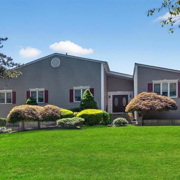 This stunning contemporary-style ranch features an open floor plan ideal for entertaining. Move-in r