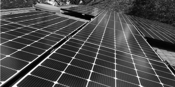 close up on the roof of a customer with solar panels in Summerville, SC just as the trees changed