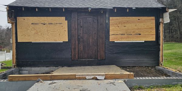 Demolition is underway! The front is exposed and ready for a new deck!
