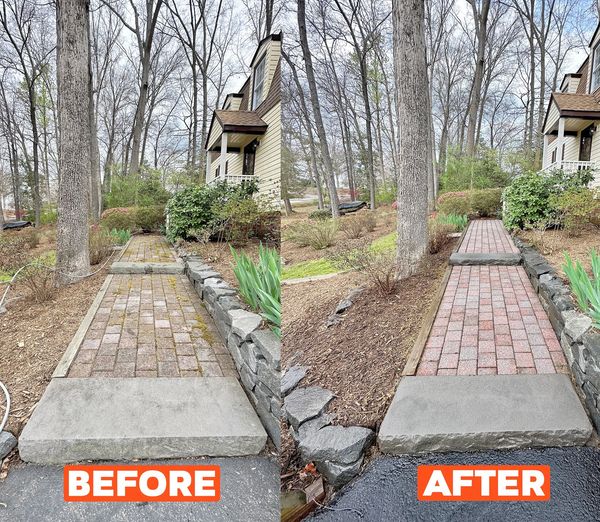 This photo is showcasing a before, and after side-by-side of brick pavers cleaned after power wash