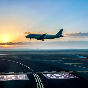 plane landing sunrise