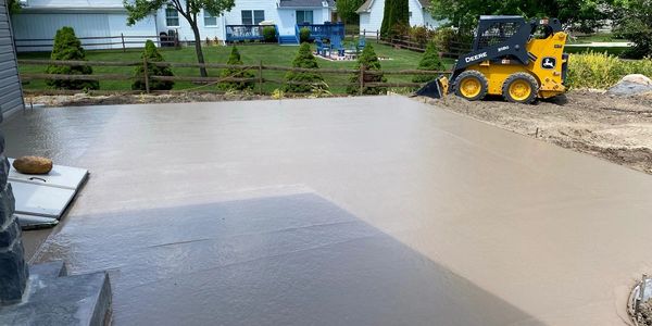 Large patio added to stamped porch and steps.