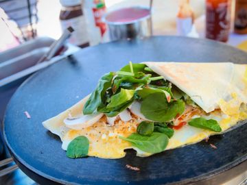 French savory crepe with signature cheese, mushroom, spinach, eggs, ham or chicken.
