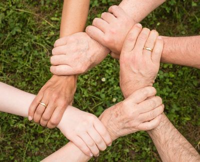 Interlocking hands, leadership