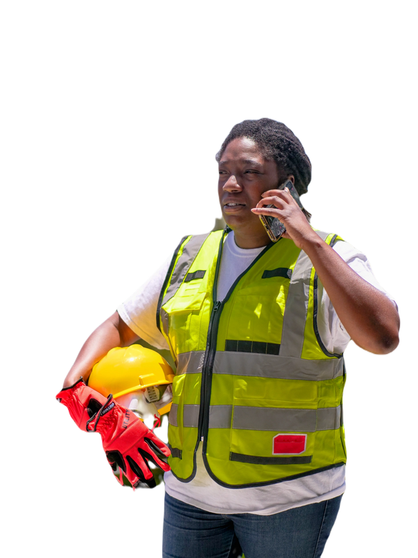 Maintenance lady on a phone call holding helmet and gloves