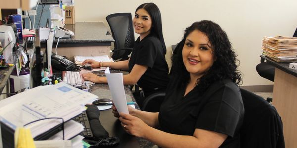 Friendly staff welcoming patient  