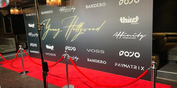 Red carpet setup with branded backdrop for Young Hollywood event.affordable backdrop rental
Los Angeles event rentals
step and repeat service