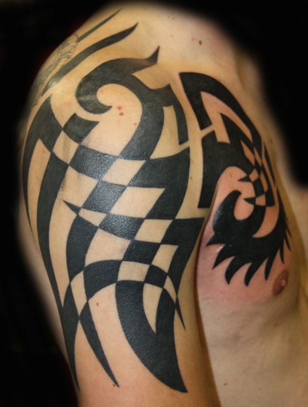 checkered flag shoulder tattoo