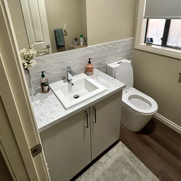 Custom-made bathroom vanity renovation in Polytec Verdehlo laminate. Southmorang VIC