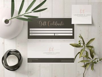 gift card on table with leaves and plant in white vase