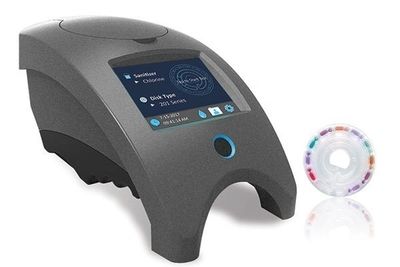 A modern water testing device with a digital display and test strip.