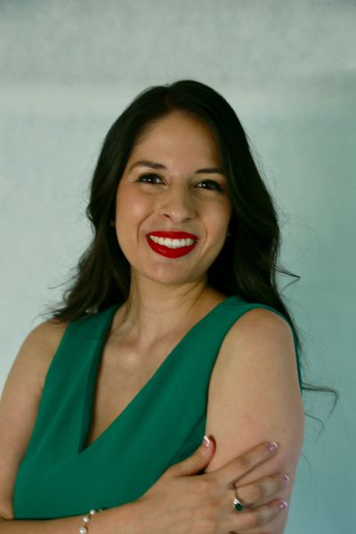 Alejandra Torres of Write Me Proudly smiling