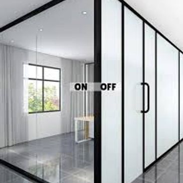 Modern office space with frosted glass doors.