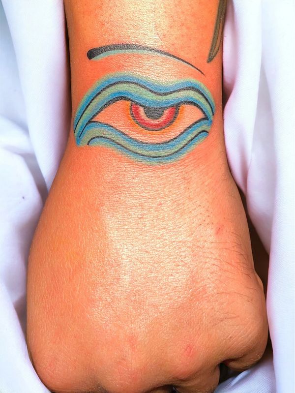 Colorful eye tattoo
