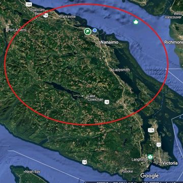 Satellite map showing Vancouver Island highlighted with a red circle.