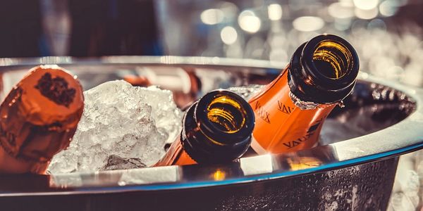 Chilled champagne on ice—luxury event hospitality and planning by 1705 Consultancy Ltd across the UK.